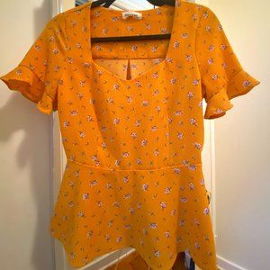 Vintage peplum top with floral print